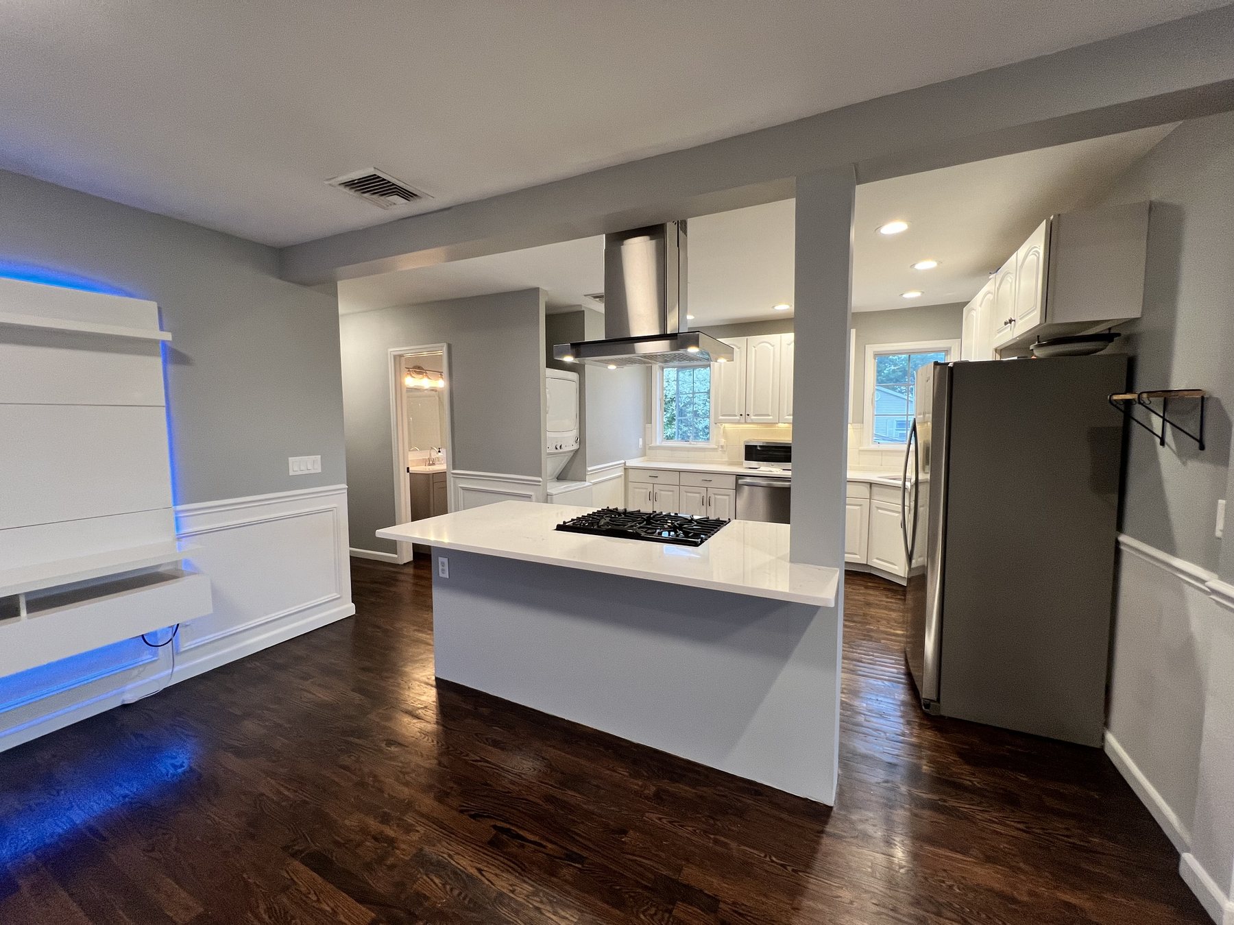Kitchen island opening to the living room