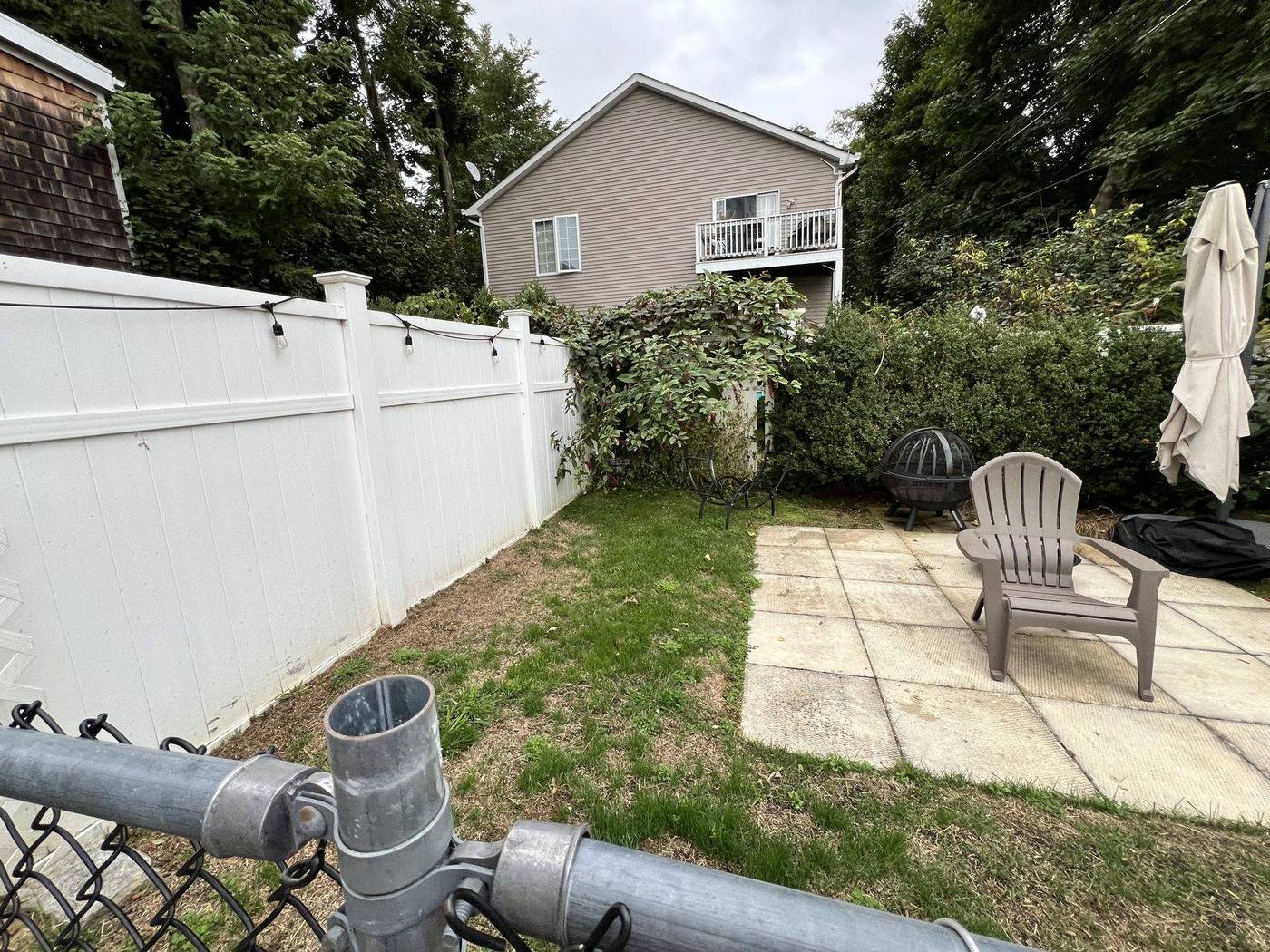 Backyard patio inside the fence